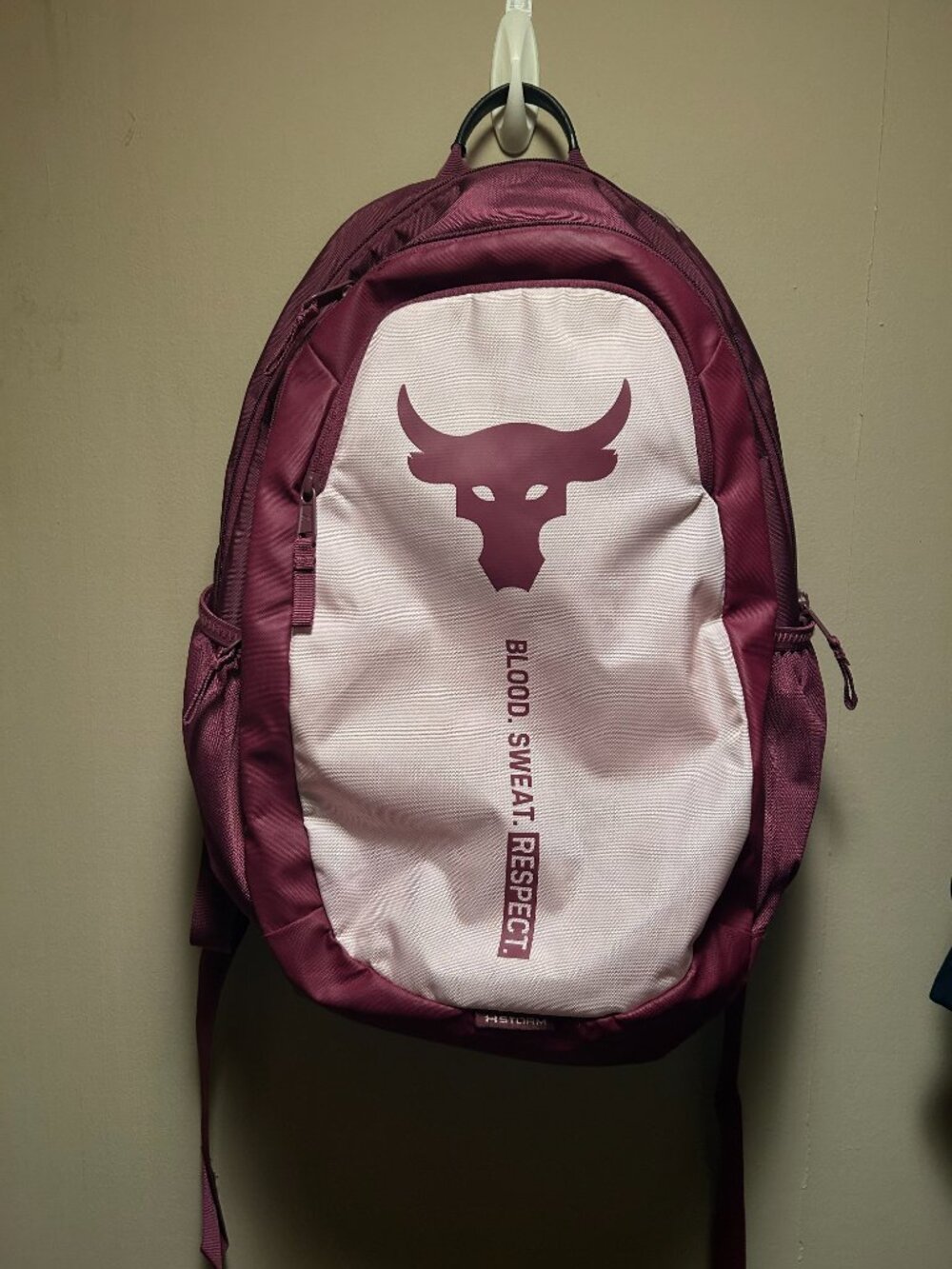 Under Armour Project Rock Brahma Backpack in maroon and pink